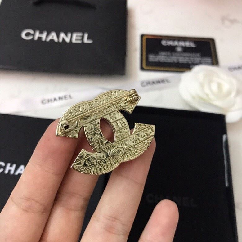 Ch**el brooches